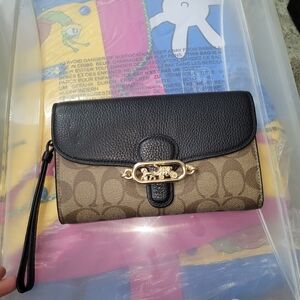 Coach Black and Tan Wristlet larger size new with tags see pics signature logo
